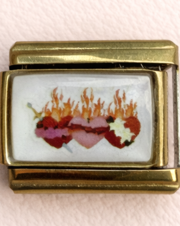The holy hearts charm