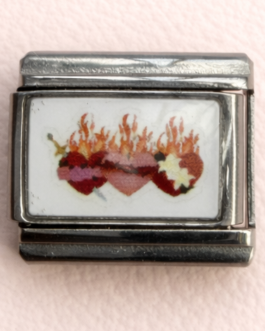 The holy hearts charm